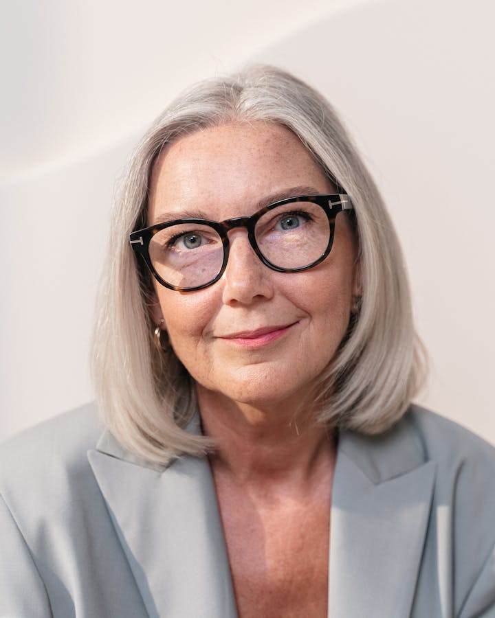 Professional headshot of Dr. Elena Vasquez